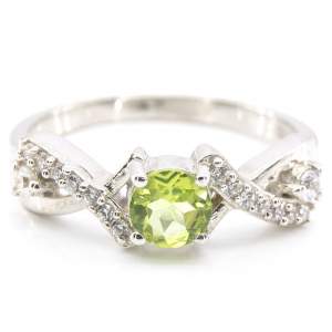 Срібна каблучка 925 проби 2,74 гр. з єгипетським хризолітом та цирконами 0,65 карат