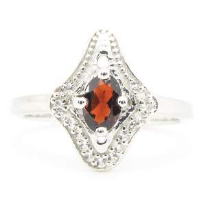 Срібна каблучка 925 проби 2,77 гр. з мозамбікським гранатом та топазами 0,61 карат з колекції 