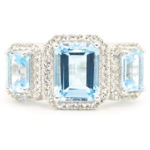 Срібна каблучка 925 проби 5,76 г з швейцарськими блакитними та білими топазами 7,22 карат