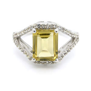 Срібна каблучка 925 проби 4,84 г з болівійським геліодором та білими топазами з США 3,05 карат