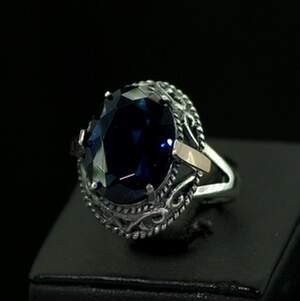 Серебряное кольцо 925 пробы с золотом 375 пробы 5,93 г с синим Альпінітом 8,22 карат Серебряное кольцо 925 пробы с золотом 375 пробы 5,93 г с синим Альпінітом 8,22 карат