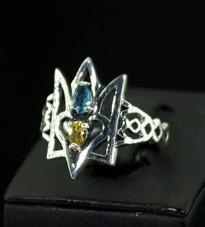 Срібна каблучка 925 проби 3,5 г з жовтим та блакитним цирконами 0,55 карат Срібна каблучка 925 проби 3,5 г з жовтим та блакитним цирконами 0,55 карат