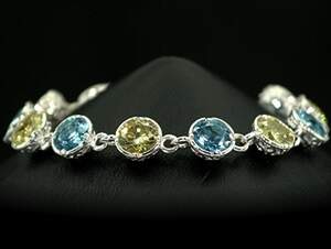 Срібний браслет 925 проби 17 г з жовтими та блакитними цирконами 35,45 карат Срібний браслет 925 проби 17 г з жовтими та блакитними цирконами 35,45 карат