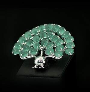 Срібна брошка 925 проби 13,04 г з зеленим Котячим оком 14,25 карат