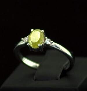 Срібна каблучка 925 проби 2,62 г з норвезьким Сфеном класу АААА та топазами зі США 1,2 карат