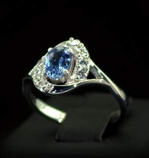 Срібна каблучка 925 проби 2,91 г з Танзанітом класу АААА та топазами зі США 1,25 карат