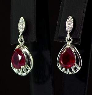 Срібні сережки 925 проби 2,99 г з африканськими Роял рубінами класу AAAA та топазами зі США 3,46 карат