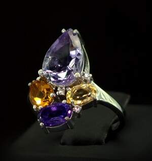 Срібна каблучка 925 проби 4,35 г з Аметистами, цитринами та фіанітами 4,62 карат