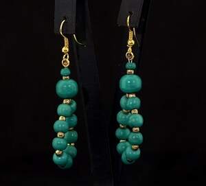 Сережки бірюзового кольору, матеріал: кістка буйвола Сережки бірюзового кольору, матеріал: кістка буйвола