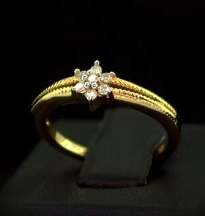 Срібна каблучка 925 проби в позолоті 750 проби 2,1 г з африканськими Діамантами VVS1 0,1 карат Срібна каблучка 925 проби в позолоті 750 проби 2,1 г з африканськими Діамантами VVS1 0,1 карат