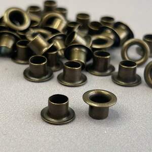 Люверс D-4мм нержавейка с пластиковым кольцом-антик (100шт) (матр.00253) Люверс D-4мм нержавейка с пластиковым кольцом-антик (100шт) (матр.00253)