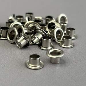 Люверс D-4мм нержавейка с пластиковым кольцом-никель (100шт) (матр.00253) Люверс D-4мм нержавейка с пластиковым кольцом-никель (100шт) (матр.00253)