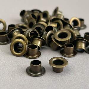 Люверс D-5мм нерж. с пласт. кольцом-антик (100шт) (матр.00254) Люверс D-5мм нерж. с пласт. кольцом-антик (100шт) (матр.00254)