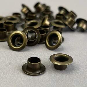 Люверс D-6мм нерж. с пласт. кольцом-антик (100шт) (матр.00255) Люверс D-6мм нерж. с пласт. кольцом-антик (100шт) (матр.00255)