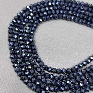 Бусины хрустальные рондель 4х3мм, нить-135 шт, иссине-черный матовый Бусины хрустальные рондель 4х3мм, нить-135 шт, иссине-черный матовый