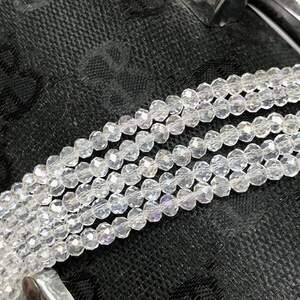 Бусины хрустальные рондель 4х3мм, нить-135 шт, прозрачный с покрытием АВ