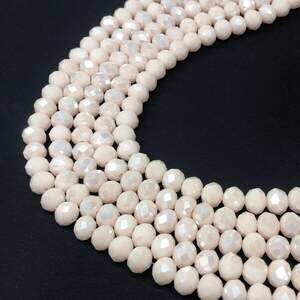 Бусины хрустальные рондель 8х6мм, нить-65 шт, бежевый матовый с АВ покрытием Бусины хрустальные рондель 8х6мм, нить-65 шт, бежевый матовый с АВ покрытием