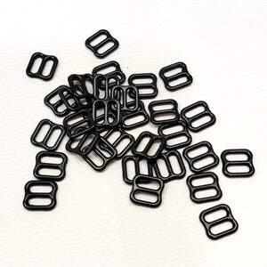 10 шт. - Черный 0,8 см регулятор-восьмерка металл для бретелей бюстгальтера -Турция 10 шт. - Черный 0,8 см регулятор-восьмерка металл для бретелей бюстгальтера -Турция