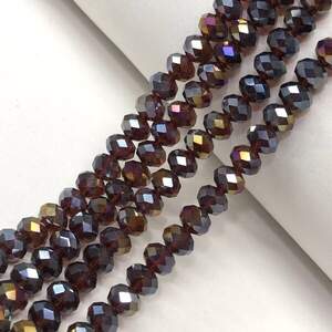 Бусины хрустальные рондель 8х6мм, нить-65 шт, гранатовый прозрачный с покрытием АВ Бусины хрустальные рондель 8х6мм, нить-65 шт, гранатовый прозрачный с покрытием АВ