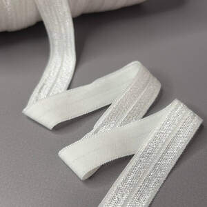 А-042Трикотажная окантовочная бейка с блеском 1,5см х 1м. - молочный А-042Трикотажная окантовочная бейка с блеском 1,5см х 1м. - молочный