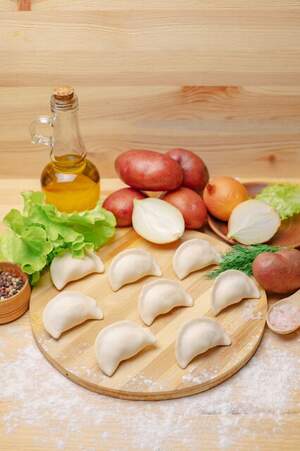 Вареники з картоплею та цибулею