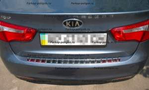 Накладка на задний бампер Kia Rio (седан) с 2012 г. Накладка на задний бампер Kia Rio (седан) с 2012 г.